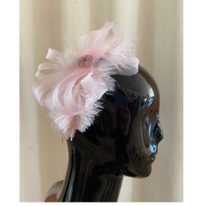 Cerchietto rosa con piume